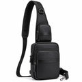 Sac bandoulière 18 x 8 x 31 cm noir en matière synthétique aspect cuir à compartiments zippés